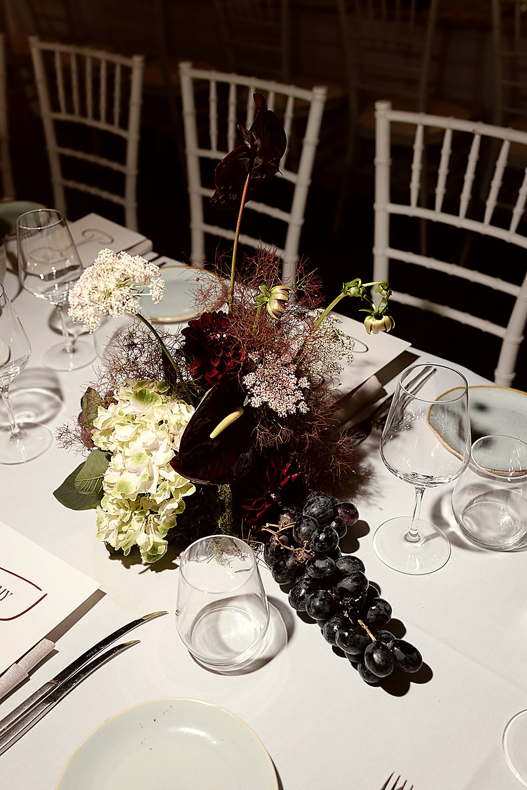 Chana and Ricky — moody table arrangement with grapes